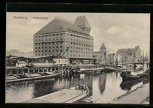 AK Duisburg, Hafenpartie mit Gebäuden und Frachtschiffen