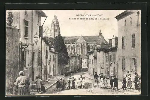 AK Saint-Nicolas-du-Port, La Rue du Haut de Tibly et la Basilique