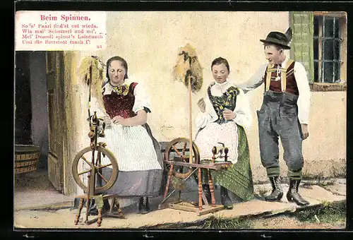 AK Damen in bayerischen Trachten beim Spinnen