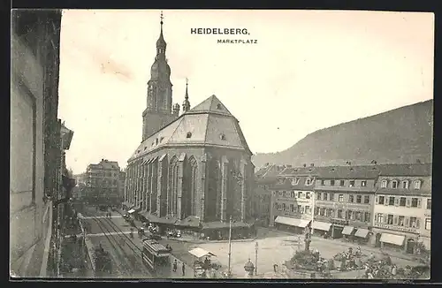 AK Heidelberg, Strassenpartie mit Geschäften, Kirche und Strassenbahn