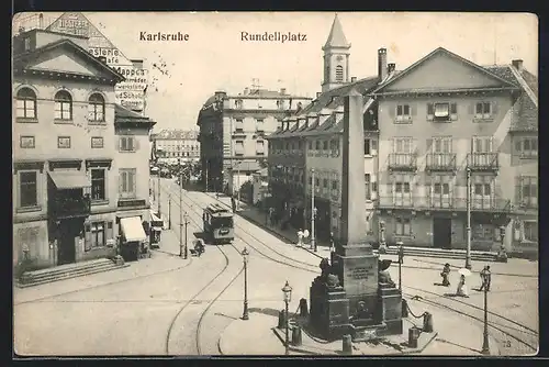 AK Karlsruhe, Strasse am Rundellplatz mit Strassenbahn