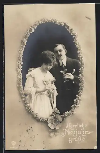 Foto-AK HB: Elegantes Paar mit Sektkelchen, Neujahrsgruss