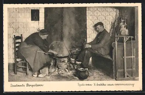 AK Alte Frau in Holzschuhen an der Kochstelle