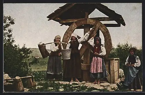 AK Rumänische Frauen holen am Dorfbrunnen Wasser