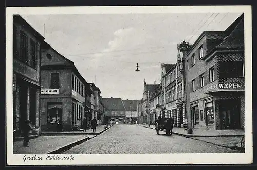 AK Genthin, Partie in der Mühlenstrasse, mit Fuhrwerk und Kolonialwarengeschäft