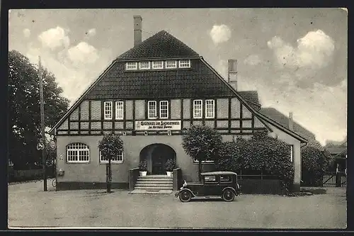 AK Hänigsen, Gasthof zum Sachsenross H. Garms, Strassenansicht mit Automobil