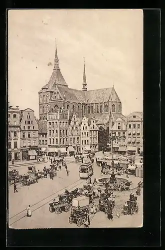 AK Rostock, Neuer Markt, Strassenbahn, Händler mit Kutschen und Fuhrwerken