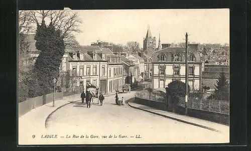 AK Laigle, la Rue de la Gare, vue de la Gare