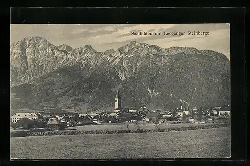 AK Saalfelden, Ortsansicht mit Kirche und Leoganger Steinberge