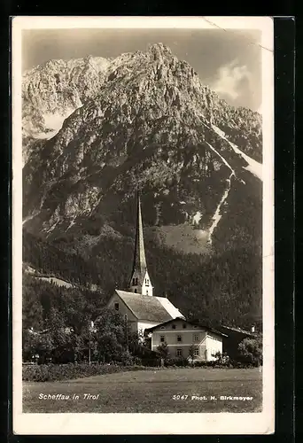 AK Scheffau in Tirol, auf der Wiese bei der Kirche