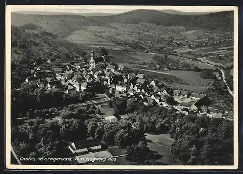 AK Castell im Steigerwald, Teilansicht mit Kirche, Fliegeraufnahme