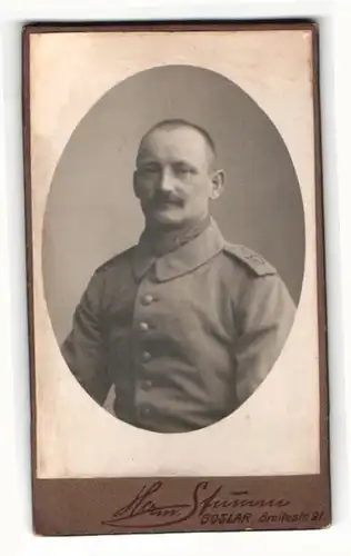 Fotografie Herm. Stumm, Goslar, Portrait Soldat in Uniform mit Schnurrbart