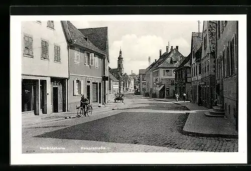 AK Herbolzheim, Hauptstrasse mit Radfahrer