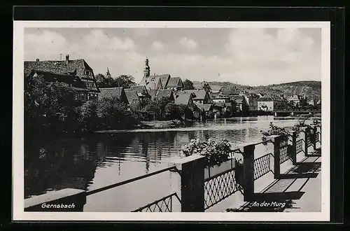 AK Gernsbach, Ortsansicht vom Ufer der Mung aus gesehen