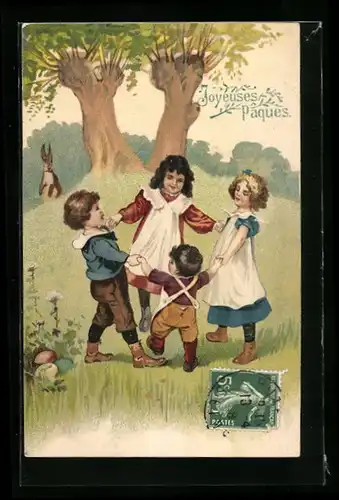 AK Vier Kinder stehen im Kreis auf der Wiese und fassen sich an den Händen an, Hase beobachtet sie, Ostern