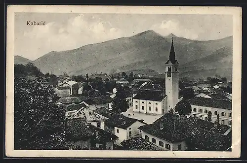 AK Kobarid, Teilansicht mit Kirche und Bergpanorama