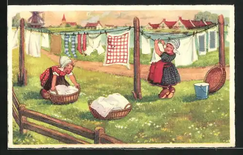 AK Zwei Holländerinnen hängen die Wäsche an die Leine