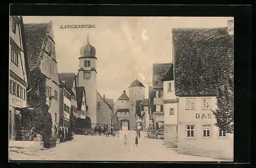 AK Langenburg, Strasse Innere Stadt mit Uhrenturm und Metzgerei