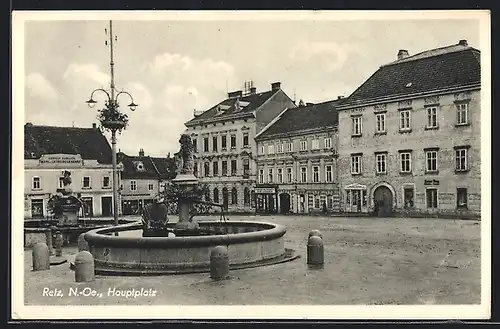 AK Retz, Hauptplatz mit Brunnen und Geschäften