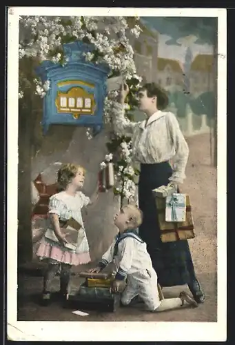 AK Frau mit zwei Kindern wirft einen Brief ein