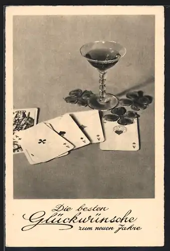 AK Glas mit Spielkarten und Kleeblättern, Neujahrsgruss