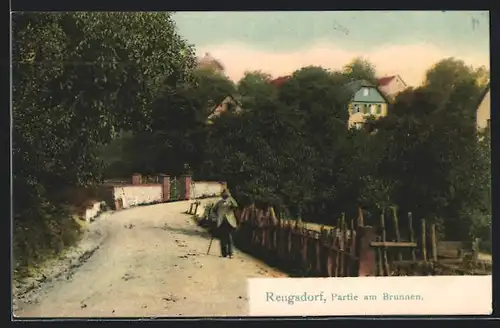AK Rengsdorf, Strassenpartie am Brunnen mit Mann