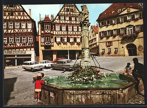 AK Herrenberg /Württ., Marktplatz mit Brunnen und Geschäften