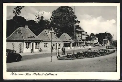 AK Plön, Bahnhofstrasse mit Friseur