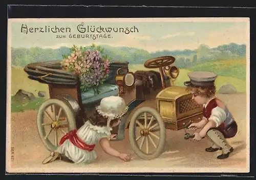 AK Pärchen versucht den Schaden an ihrem Auto zu reparieren