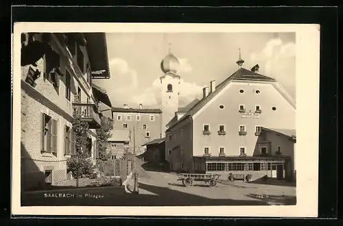 AK Saalfelden im Pinzgau, Strassenpartie mit Gasthof zur Post