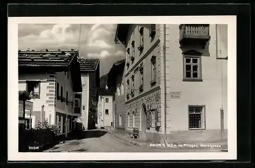 AK Rauris im Pinzgau, Strasse Martkgasse mit Geschäft