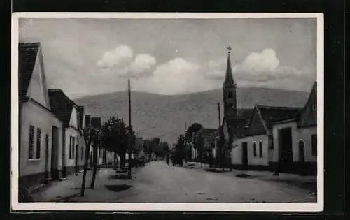 AK Unter-Pullendorf, Strasse mit Blick zur Kirche