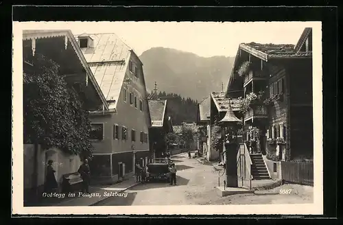 AK Goldegg im Pongau, Strassenpartie mit Brunnen