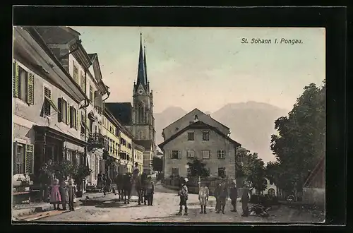 AK St. Johann i. Pongau, Strassenpartie mit Kirche
