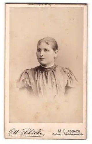 Fotografie Otto Schülke, M.-Gladbach, Portrait junge Dame mit zurückgebundenem Haar
