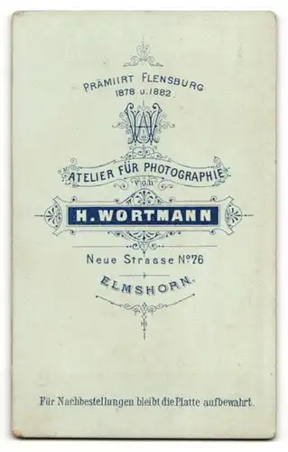 Fotografie H. Wortmann, Elmshorn, Portrait junger Herr in modischer Kleidung mit Fliege