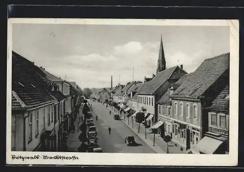 AK Pritzwalk, Blick über die Marktstrasse zum Kirchturm hin