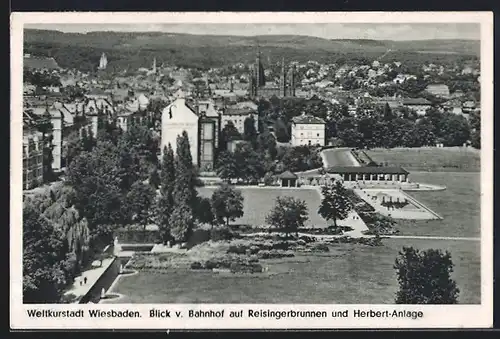AK Wiesbaden, Blick vom Bahnhof auf Reisingerbrunnen und Herbert-Anlage mit Hotel Schwarzer Bock