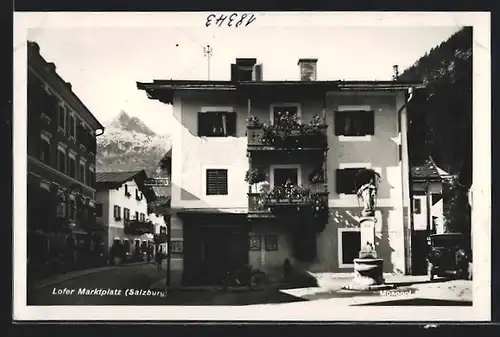 AK Lofer, Partie am Marktplatz, Motorrad