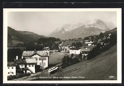 AK Fieberbrunn, Ortsansicht mit Wildem Kaiser