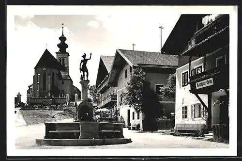 AK Sankt Veit im Pongau, Strassenpartie, Blick zur Kirche