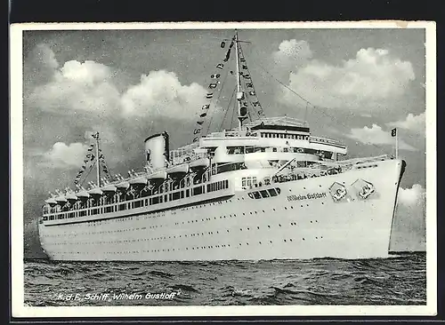 AK KdF.-Passagierschiff Wilhelm Gustloff mit Flaggengala in See stechend, 