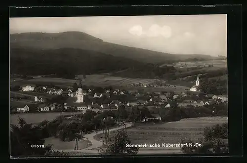 AK Kobersdorf, Ortsansicht mit Kirchen