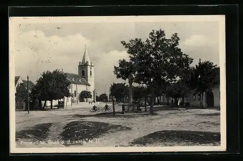 AK Parndorf, Strassenansicht mit Kirche