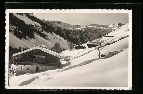 AK Saalbach, Gasthaus Mitter-Lengau im Winter