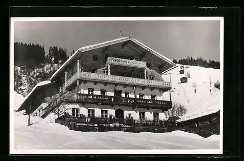AK Saalbach, Winterlich verschneites Hotel