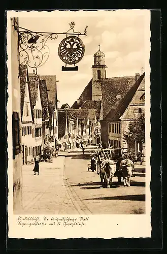 AK Dinkelsbühl, Segringerstrasse mit St. Georgskirche und Ochsenfuhrwerk