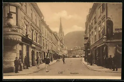 AK Cilli, Hauptplatz mit Passanten und Kirche