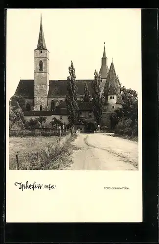 AK Iphofen /Mfr., Kirche mit Durchgangstor