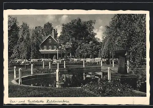 AK Volksdorf b. Schaumburg /Lippe, Kur- und Gasthaus Bad Hiddersenborn F. Plenge, Gartenansicht mit Teich